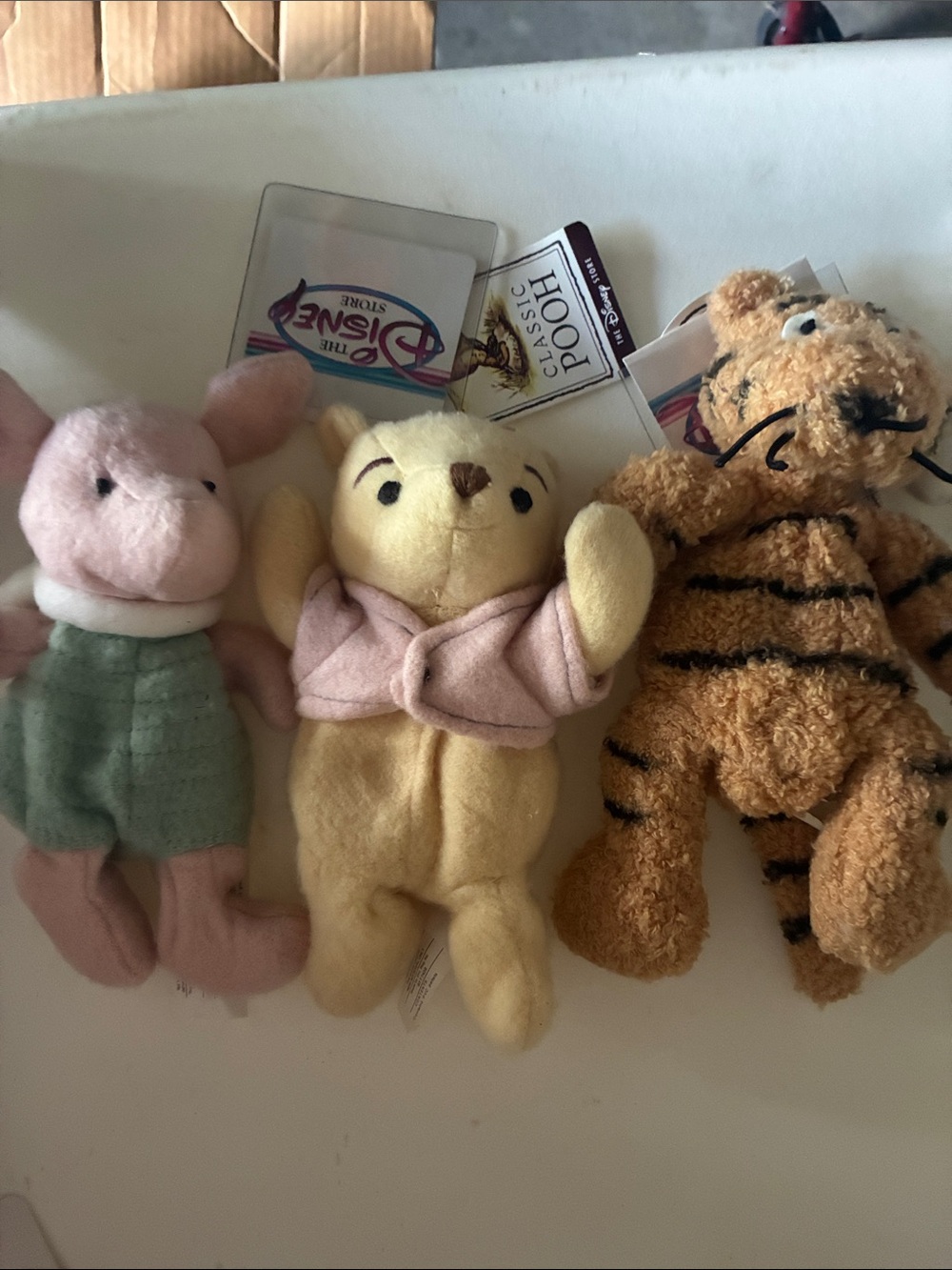 Disney Plush Trio - Winnie the Pooh (yellow), Piglet (pink), Tigger (orange)